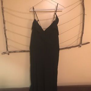 Black jumpsuit was hemmed to be capris.